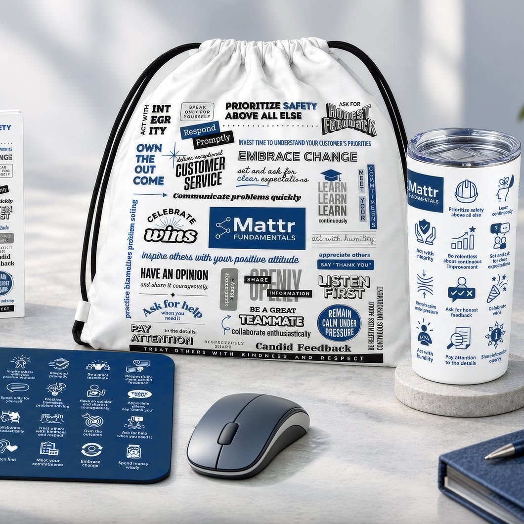 Company principles swag kit: drawstring bag, booklet, tumbler and mousepad printed with the principles
